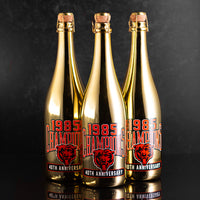 Gold 1985 Champions Chicago Bears 40th Anniversary bubbly wine bottles from Mano's Wine