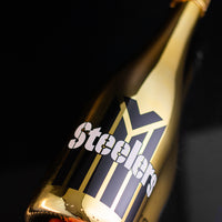 Order a bottle of bubbly wine featuring the 1933 Pittsburgh Steelers jersey design from Mano's Wine