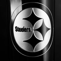 Close up image of the Pittsburgh Steelers team logo on custom season ticket holder wine bottle