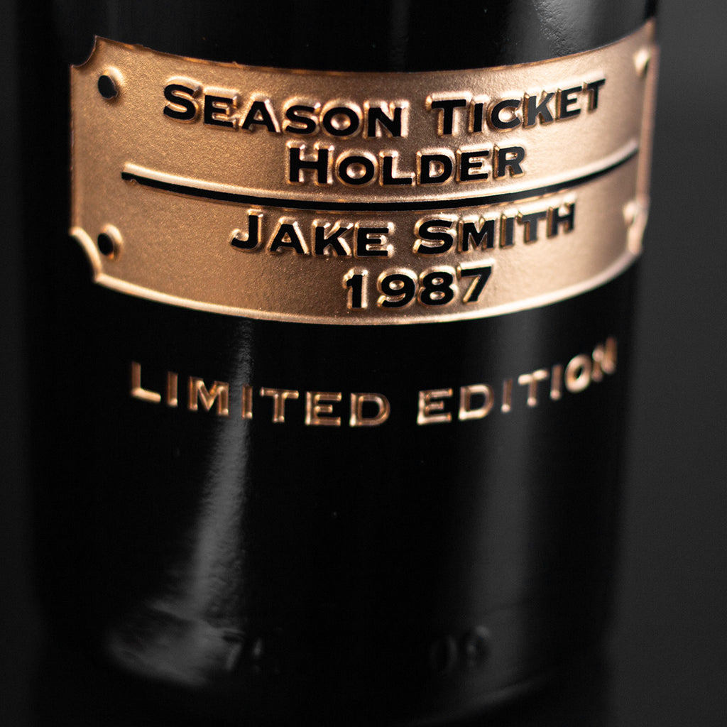 Steelers custom season ticket holder etched wine bottle showing name and year of season ticket holder