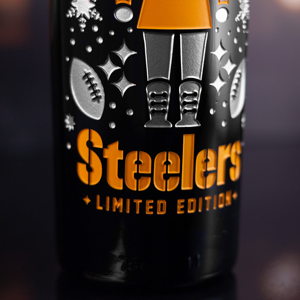 Order the Pittsburgh Steelers limited edition 2025 holiday etched wine bottle from Mano's Wine