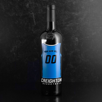 Bottle of wine with a blue Creighton University basketball jersey design on a dark background