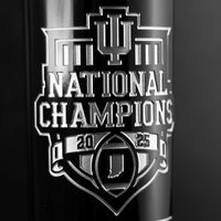 Indiana University National Champions 2025 football state of Indiana etched in silver on Mano's Wine championship bottle