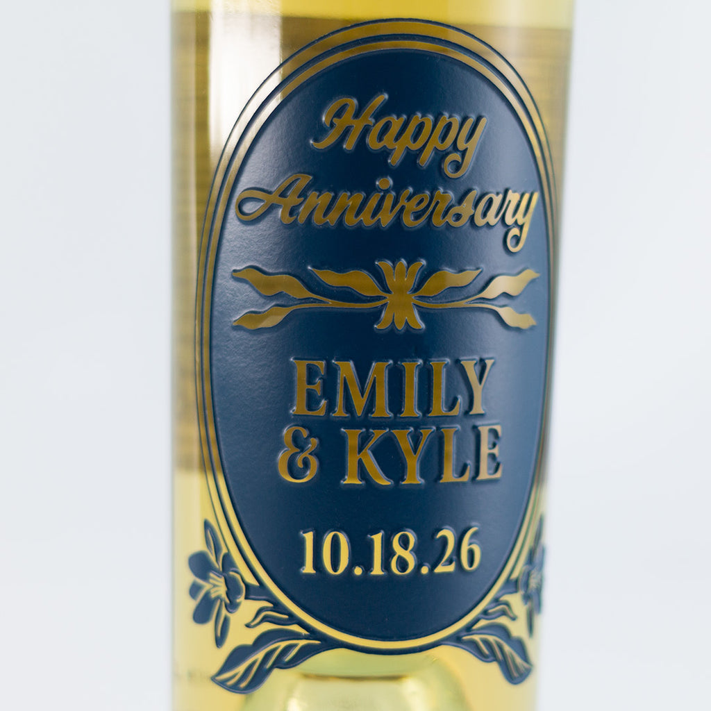 Close up of Mano's Wine Anniversary Floral Frame Chardonnay Custom Etched Wine bottle