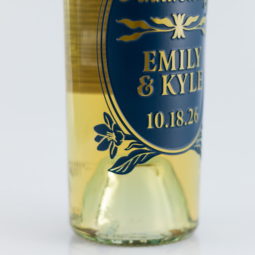 Couple name and anniversary date etched on customizable chardonnay wine bottle from Mano's Wine