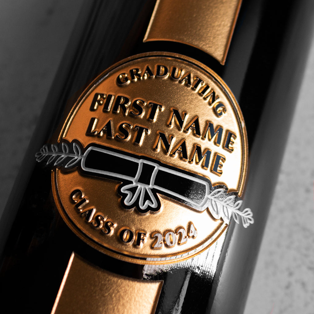 Graduating class, graduate name, and diploma etched on the Mano's Wine Graduation Award Etched Wine bottle