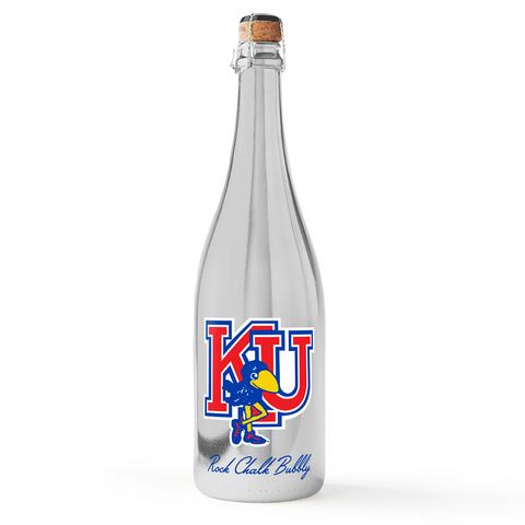 Mano's Wine metallic silver bubbly wine bottle featuring KU logo and retro Jayhawk logo with script text "Rock Chalk Bubbly"