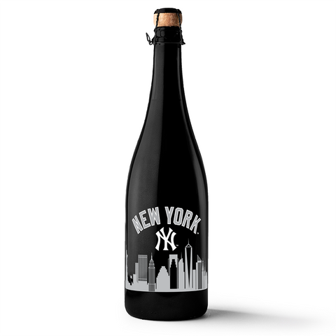 Mano's Wine metallic silver bottle of bubbly wine featuring the New York Yankees team logo and New York skyline