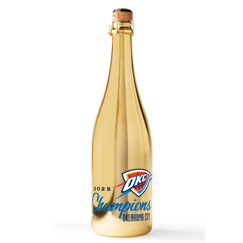 Mano's Wine gold bottle of bubbly wine featuring OKC Thunder logo and 2025 champions and Oklahoma City text