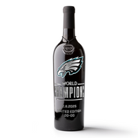 Red wine bottle etched with Philadelphia Eagles team logo and 2024 World Champions text