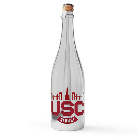 Silver bottle of wine bubbly with the letters USC for University of South Carolina from Mano's Wine