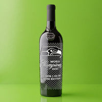 Seattle Seahawks 2025 World Champions silver etched wine bottle with light green background