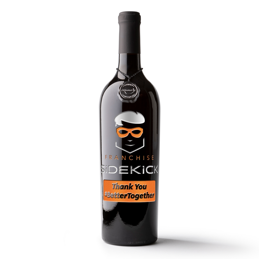 Franchise Sidekick Stock and Release Thank You #BetterTogether white and orange text on a Mano's Wine bottle