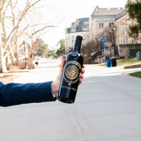 Customize a Graduate Laurel Etched Wine bottle for college graduates