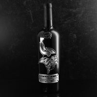 Black wine bottle with Minnesota Vikings team logo and custom etched season ticket holder design