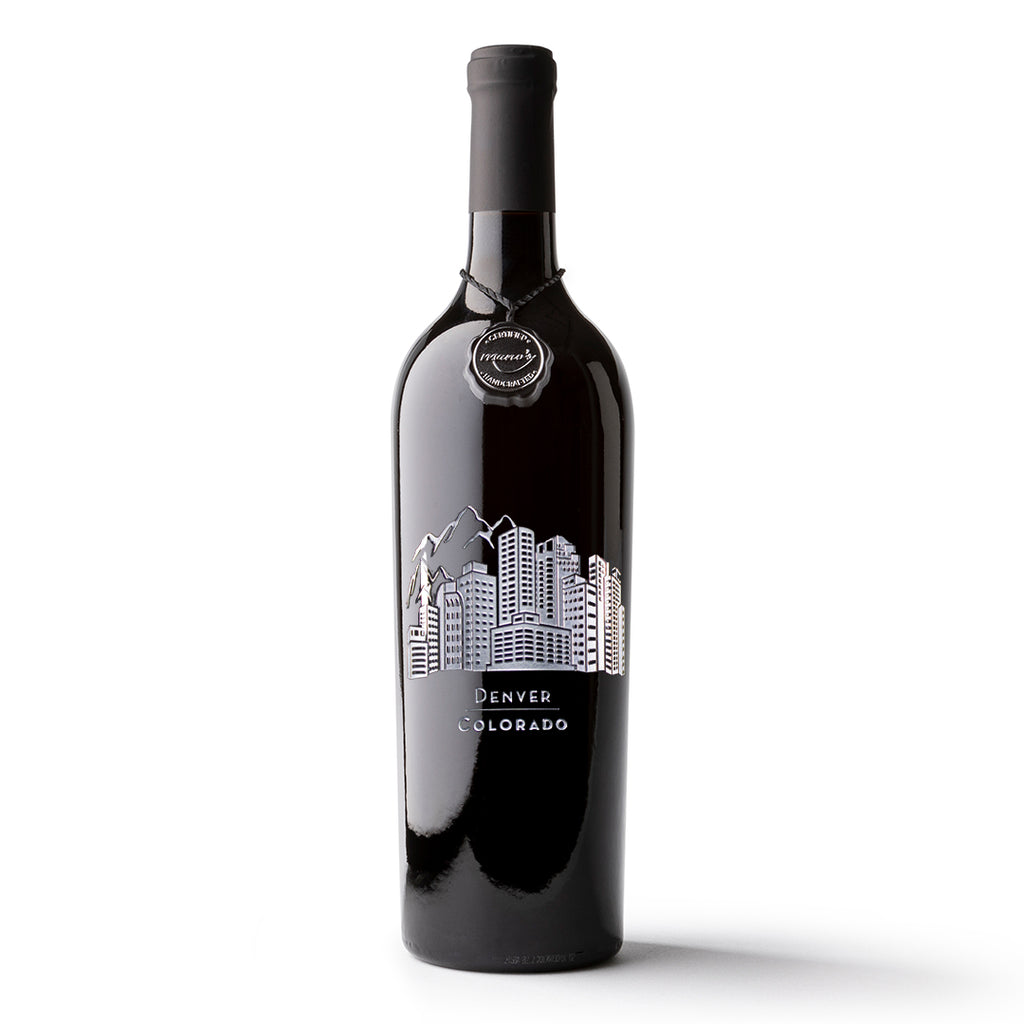 Mano's Wine bottle featuring the Denver, CO city skyline and Rocky Mountains
