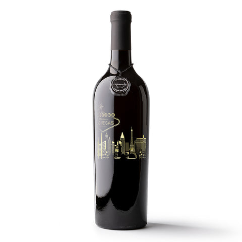 Mano's Wine bottle featuring the iconic Las Vegas welcome sign and city skyline